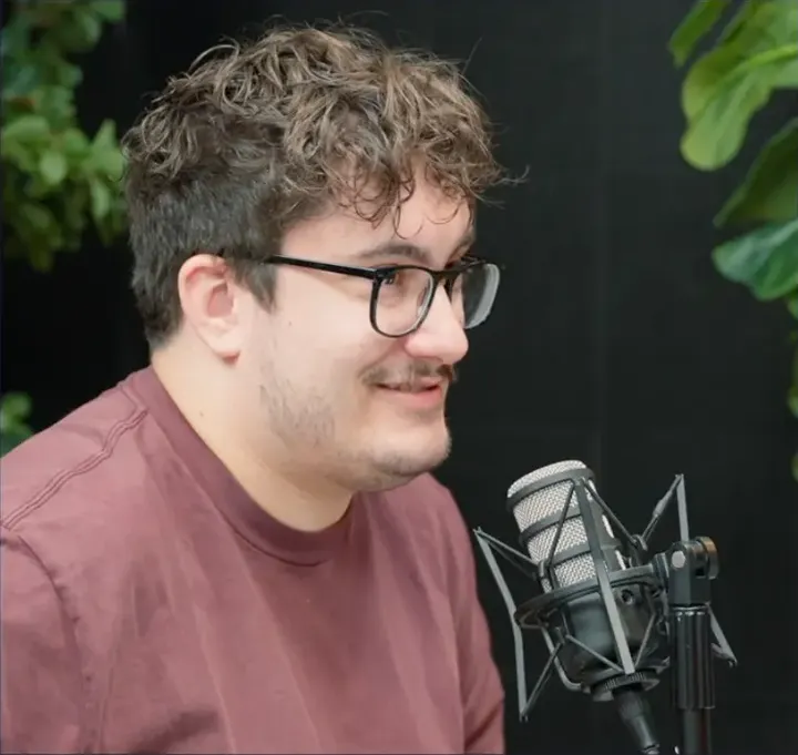 Caleb Hammer recording a podcast at JPR Studios