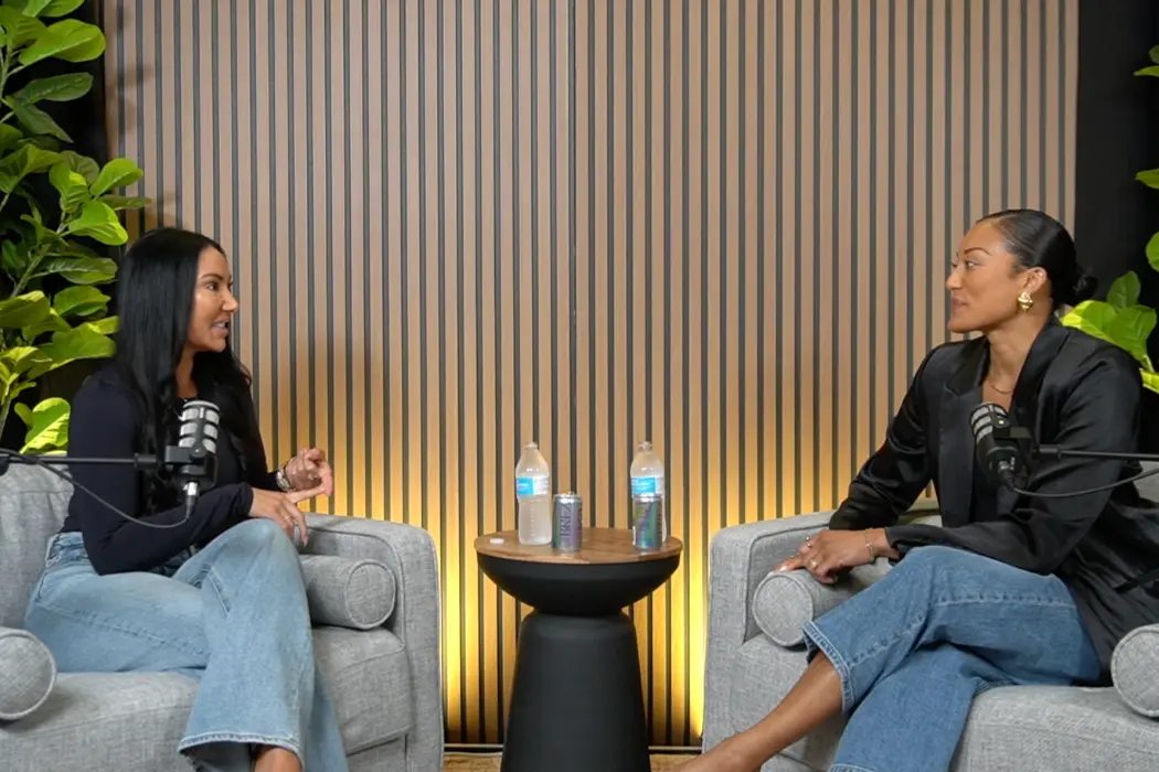 Host and guest recording a podcast in a JPR studio lounge setup