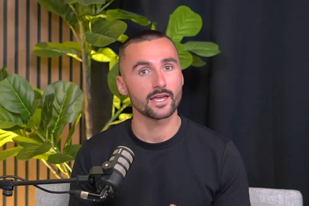 Creator recording a direct-to-camera YouTube video in the studio